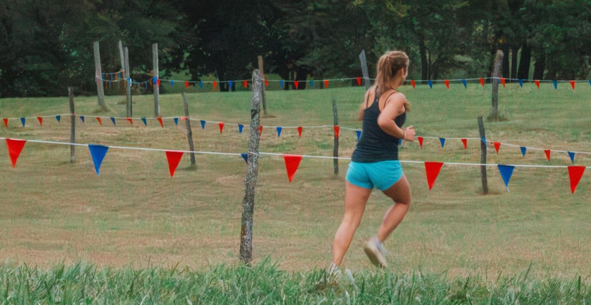 During the cross country campout, senior Greta Barnett runs the Rim Rock Course. Every year the cross country team travels to Rim Rock to run the course and promote team bonding. “The campout is such a great way to start the season and first build the [Free State Cross Country] community,” Barnett said.