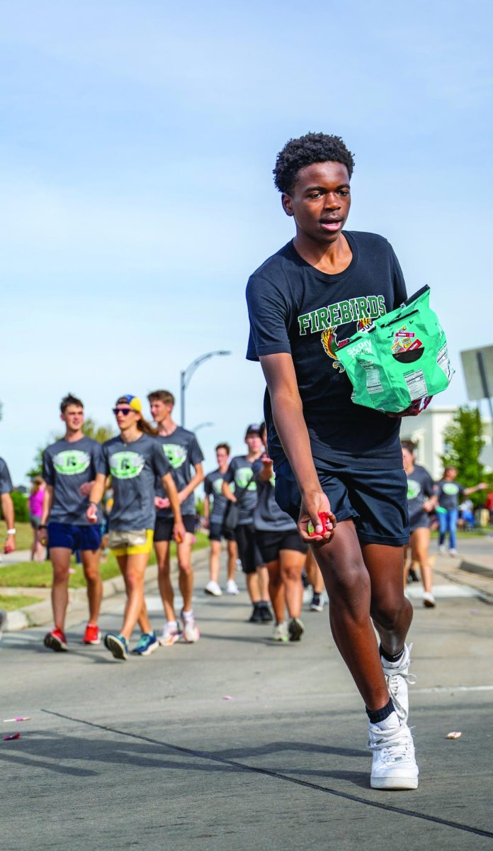 HOCO PARADE: 
Free State’s annual homecoming parade was held on Sept. 27. Clubs and athletic teams created elaborate floats and tossed candy to community members along the parade route.