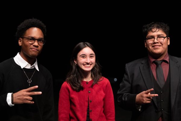 Lawrence Virtual School senior Jesse Johnson, Free State High senior Anwen Williams and Lawrence High senior Juan Casimiro-Mendoza pose for a photo after the ceremony.