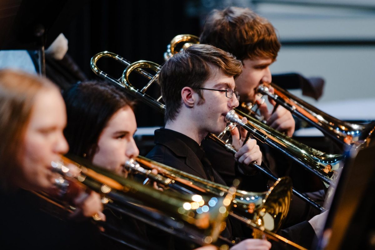 Symphonic band member Alex Kerr plays Trombone during the concert.